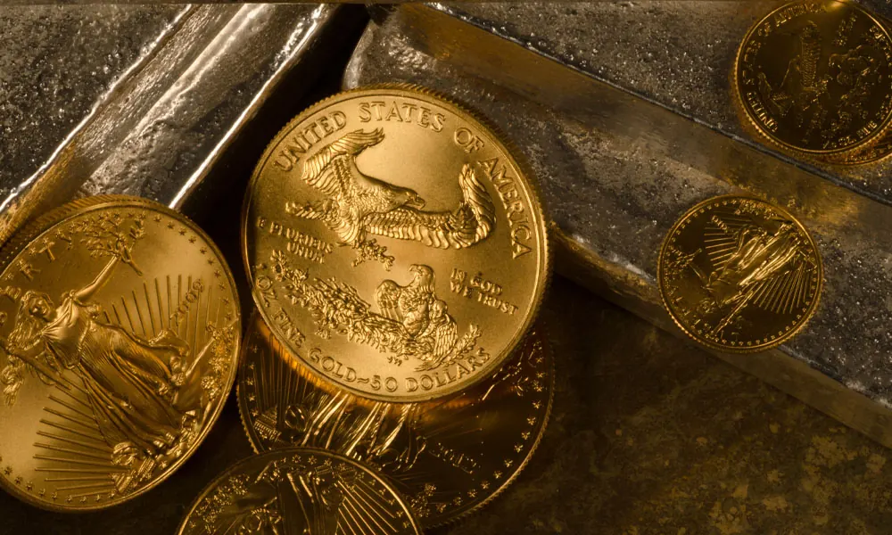 American Gold Eagles resting on silver bars